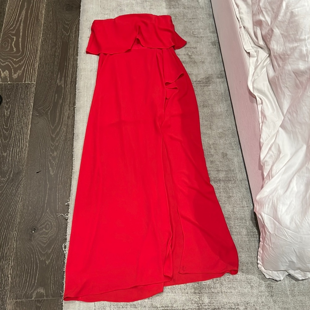 Red strapless open slit dress